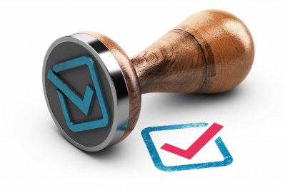 Blue check mark and rubber stamp over white background. 3d illustration.